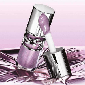 YSL Saint Laurent Lip Jelly Dare to Love in clear bottle with silver logo and glittery cap, showcasing sheer glossy purple lip shine