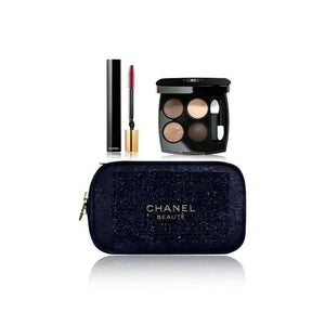 CHANEL 25th Anniversary limited edition makeup set with nude eyeshadow palette, black mascara, and blue velvet case with gold zipper