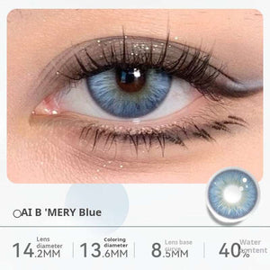 Close-up of an eye wearing "All B 'Mery Blue" contact lenses, featuring a vibrant, clear blue color. Specifications: 14.2mm diameter, 13.1mm graphic diameter, 8.5mm base curve, 40% water content.