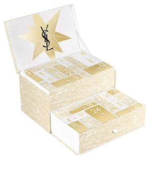 تقويم YSL 2025 بتصميم فاخر على شكل علبة مجوهرات مطلية بالذهب مع منتجات تجميل وعطور مصغرة وهدايا إضافية