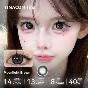 Model wearing classic Moonlight Brown contact lenses for a warm, daily elegant appearance.