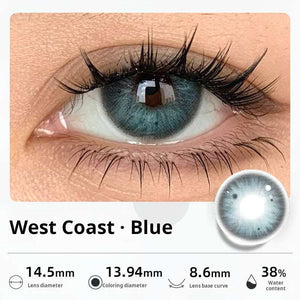 Close-up of an eye wearing "West Coast - Blue" contact lenses, featuring a bright, ocean-blue gradient. Specifications: 14.5mm diameter, 13.94mm graphic diameter, 8.6mm base curve, 38% water content.