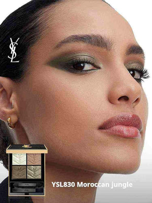 Close-up of a woman wearing YSL Couture Color Eyeshadow in YSL830 Moroccan Jungle with an elegant gold and black eyeshadow palette beside her.