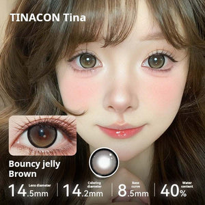 Model wearing Tinacon Bouncy Jelly Brown cosmetic contact lenses with 40 percent water content for a wide anime eye look.