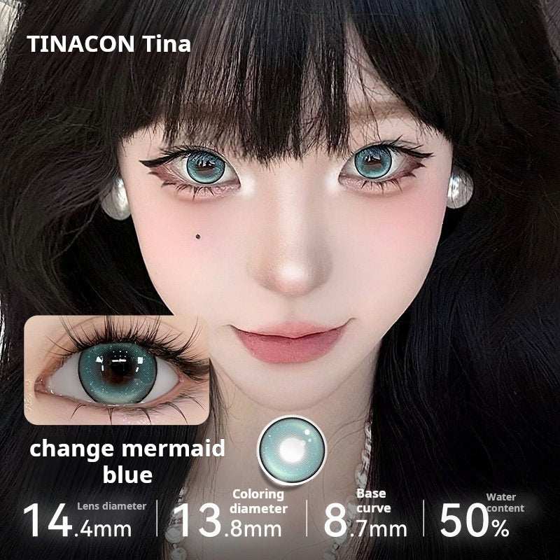 A close-up of a model wearing Tinacon Mermaid Blue contact lenses with 14.4mm diameter, showing the vibrant icy blue color on dark eyes.