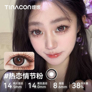 Model wearing Tinacon Passionate Pink aesthetic contact lenses with a 14.5mm diameter and 38 percent water content.