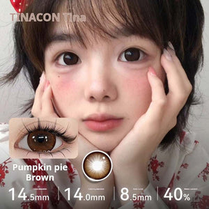 Model wearing Tinacon Pumpkin Pie Brown soft contact lenses with a warm, natural gradient tone.