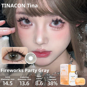 Close-up of an eye wearing Fireworks Party Gray lenses with a distinct outer ring. Specs: 14.5mm diameter, 13.6mm graphic diameter, 8.6mm base curve, 38% water content.