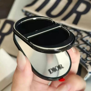 Dior Phone Ring Holder with Integrated Compact Vanity Mirror.
