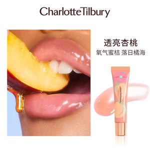 زيت شفاه لامع بدرجة Pure Peach، شفاه مع شريحة خوخ وأنبوب بلون الخوخ