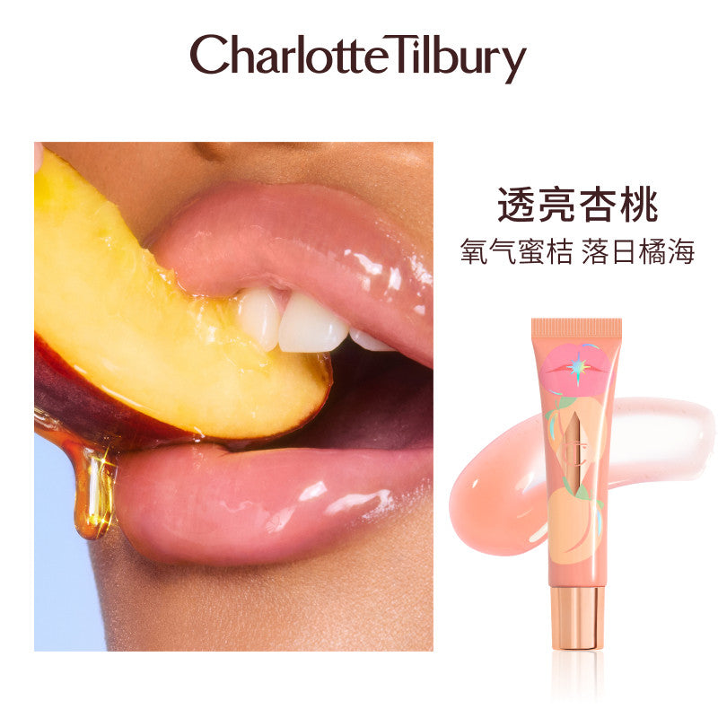 زيت شفاه لامع بدرجة Pure Peach، شفاه مع شريحة خوخ وأنبوب بلون الخوخ