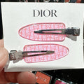 Dior Designer Hair Clips – Stylish Pink Logo Hair Accessories.