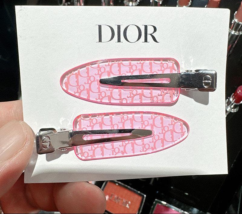 Dior Designer Hair Clips – Stylish Pink Logo Hair Accessories.