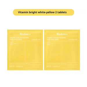 Two yellow face mask packages with 'Biodance' branding on a white background.