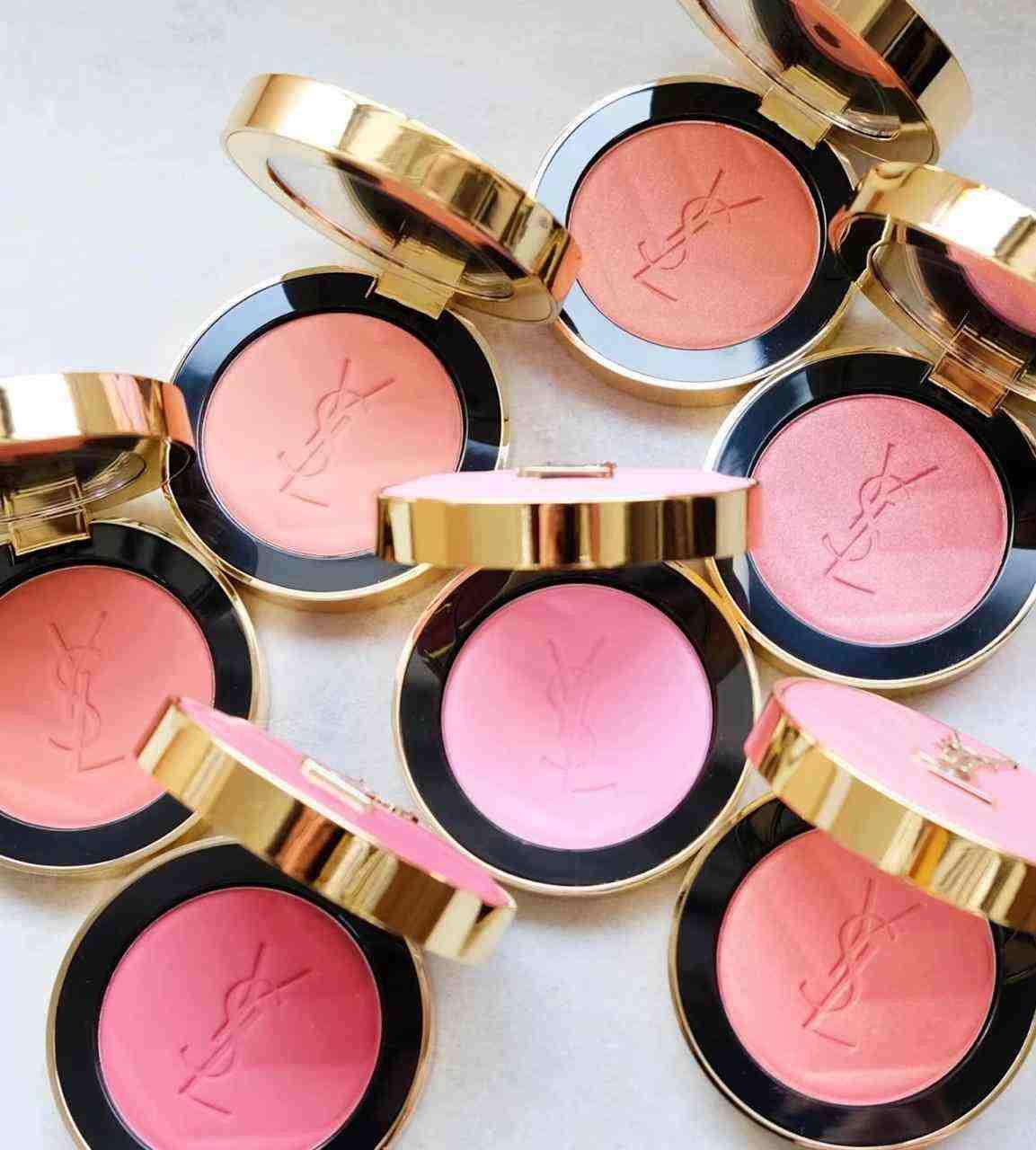 بلشر سان لوران بألوان متنوعة مع علبة ذهبية لامعة.