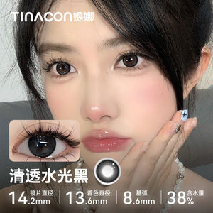 Close-up of a model wearing Tinacon Clear Water Black glossy contact lenses with 38 percent hydration for a deep look.
