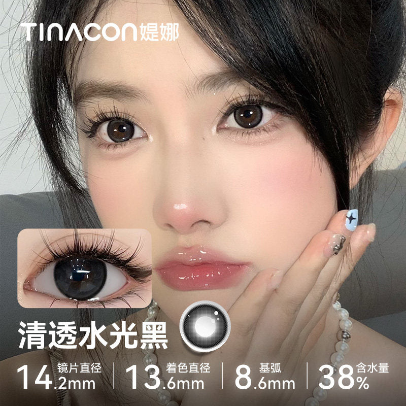 Close-up of a model wearing Tinacon Clear Water Black glossy contact lenses with 38 percent hydration for a deep look.