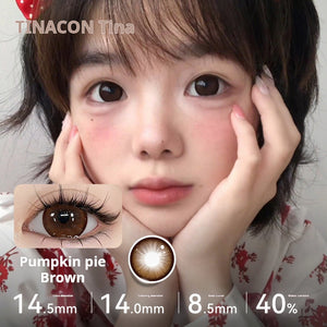 Model wearing Tinacon Pumpkin Pie Brown soft contact lenses with a warm, natural gradient tone.