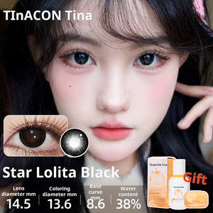 Close-up of an eye wearing Star Lolita Black lenses, providing a sharp, high-definition black doll-eye effect. Specs: 14.5mm diameter, 13.6mm graphic diameter, 8.6mm base curve, 38% water content.
